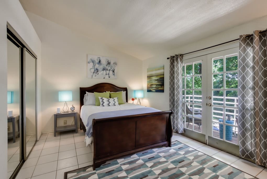 Enjoy a bright, modern and colorful private room with your own balcony and private full bath inside of your bedroom.