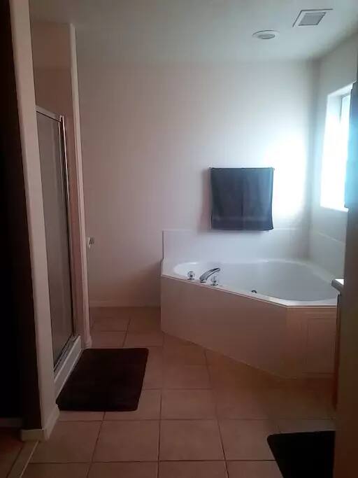Private Bathroom - look for towels and supplies in the cabinets.