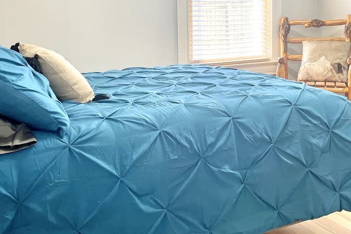 Sit back and read a book with the sun shining on you in the quite 2nd bedroom