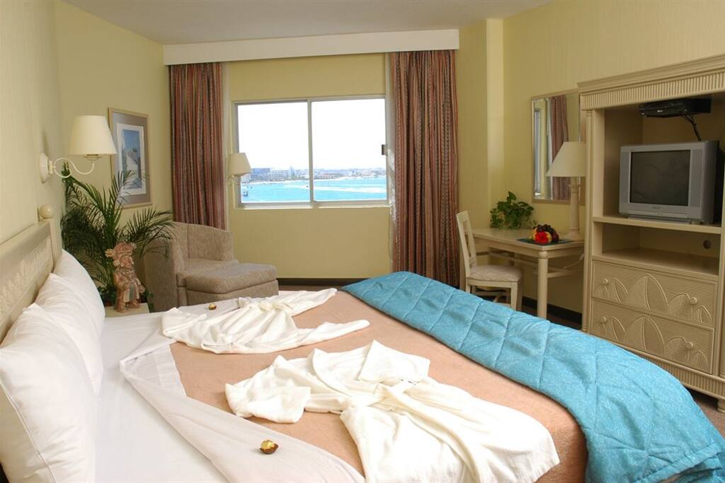 King-Size bed ocean view suite.