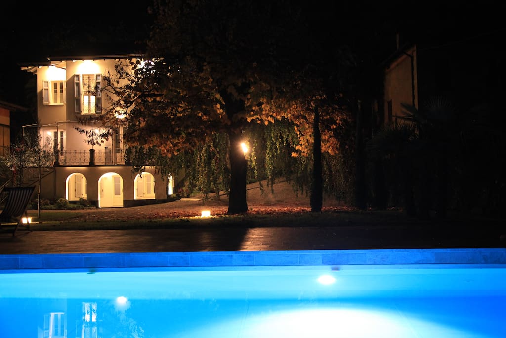 The pool and garden by night