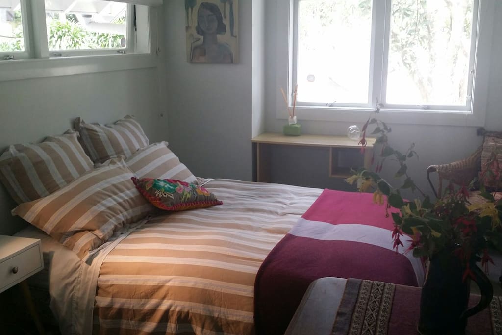 Double bed light filled bedroom with outlook onto quiet street