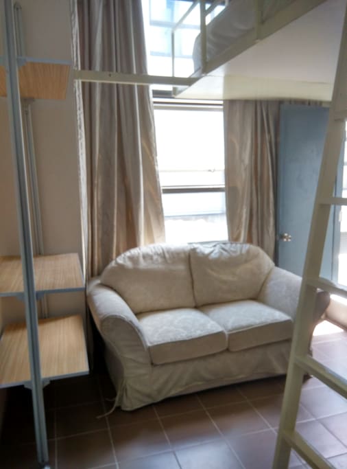 Sofa and designer open shelf