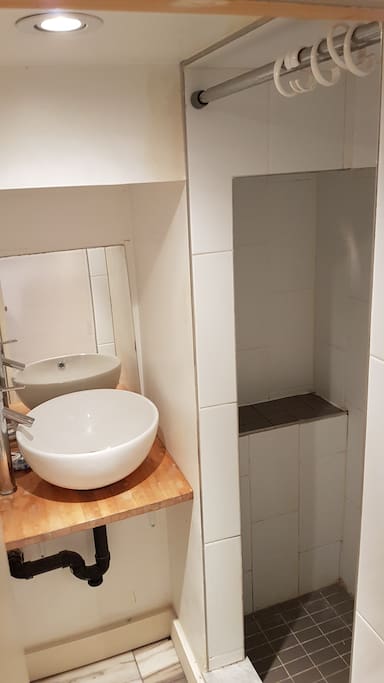 Bathroom with small shower