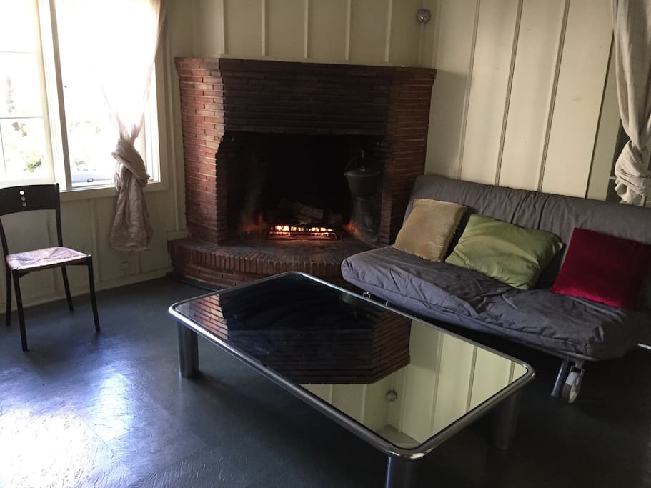 Private living room with fireplace.
