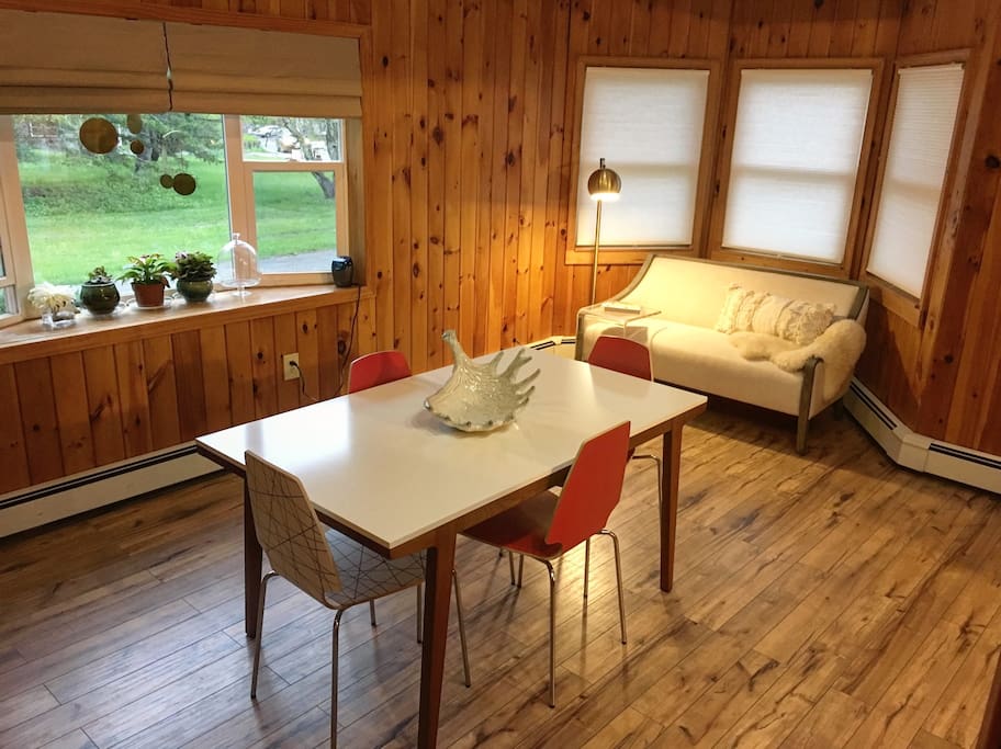 Sunny dining room & bay window reading nook.