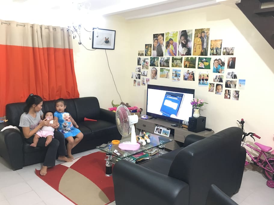 Here’s what our living room looks like we have free wifi, I have 2 kids and 2 maids to assist you with your needs