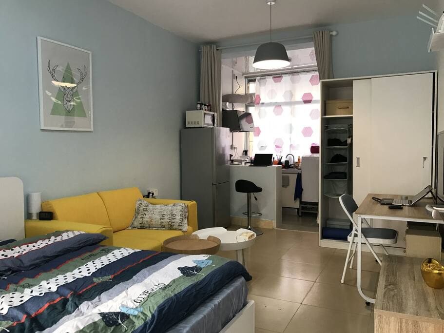 Sofa, kitchen and work space