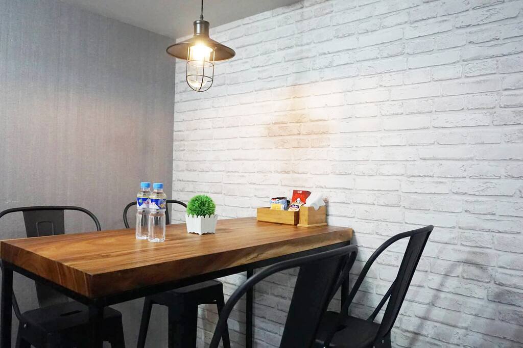Dining area 1: Furnished with bar table and bar stools