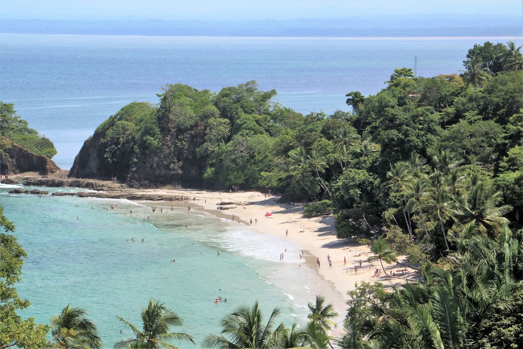 Walk to Playa Blanca Punta Leona from luxury condo Condominiums for