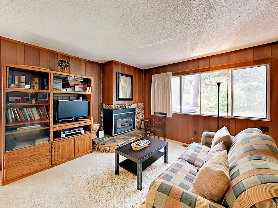 Get comfortable in the wood-accented living room.