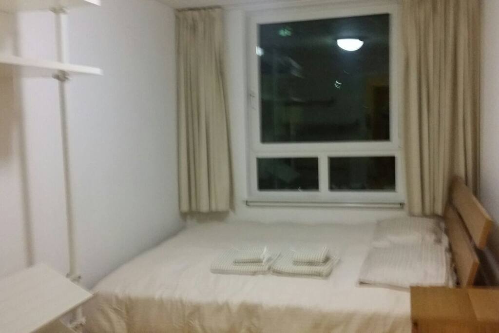 Comfortable double room with clothes storage facilities