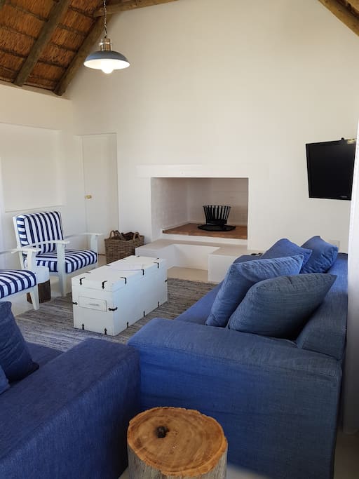 living area with fireplace and full DSTV