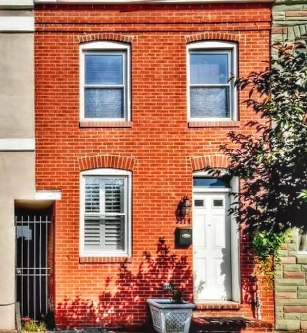 Historical Rowhouse with brick exterior