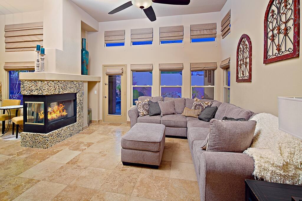Relax and enjoy natural light and a romantic fireplace.