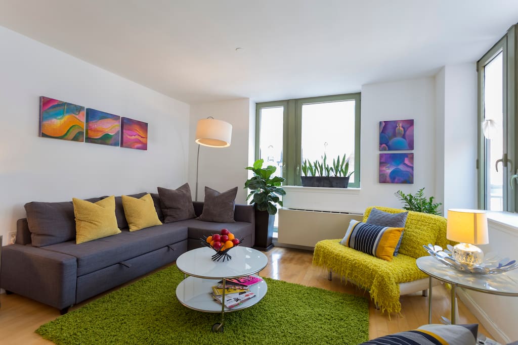 Spacious living room with sofa beds that accommodate 4 adults