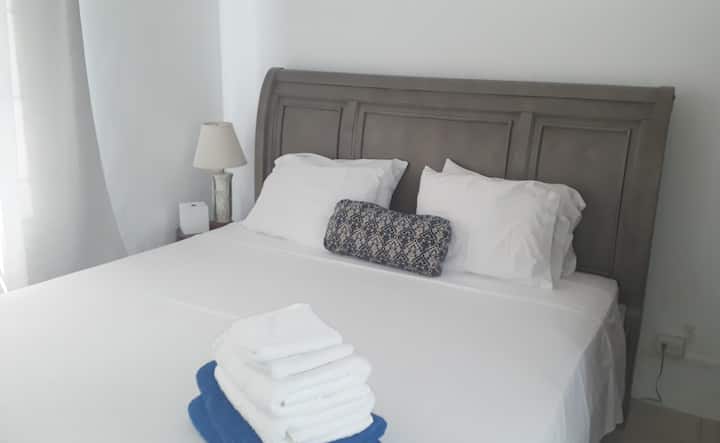 Furnished with a queen bed. 