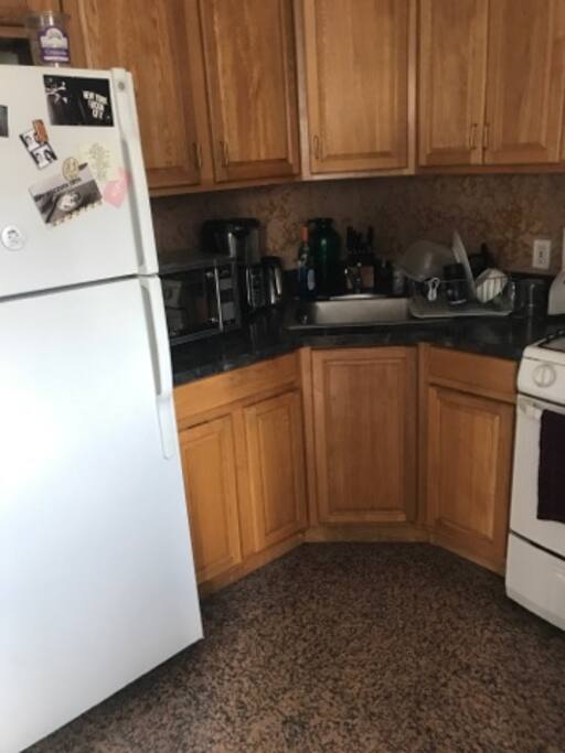The kitchen is fairly large and you will be given a large shelf is the fridge to place your groceries (if you choose).