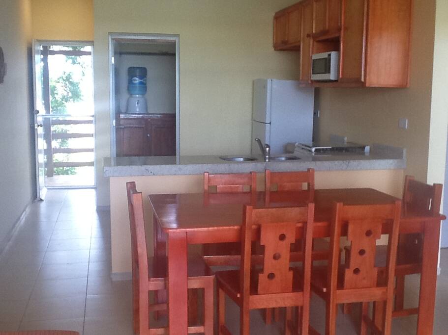 Kitchen with dining for six. Invite some friends over!