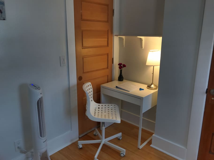Laptop workspace with complete guidebook to the area.