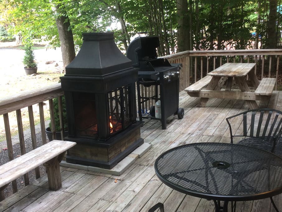 Deck w/ patio furniture, outdoor fireplace and gas grill