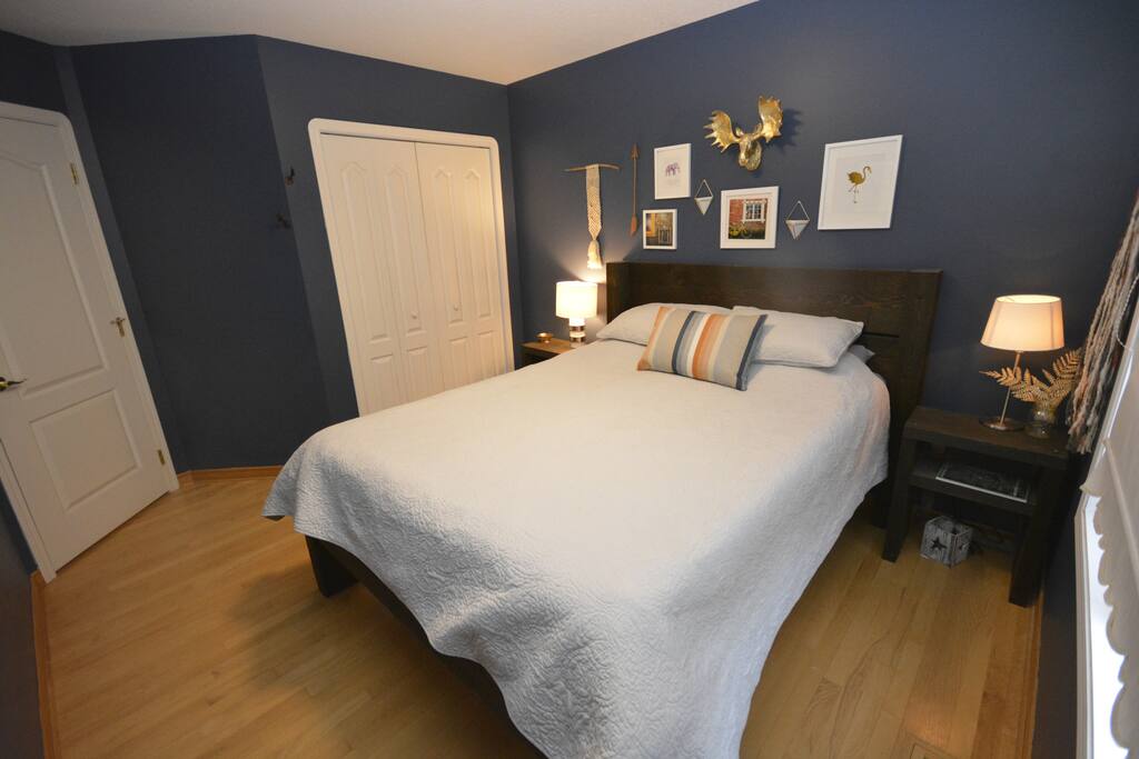 Bright bedroom with queen bed