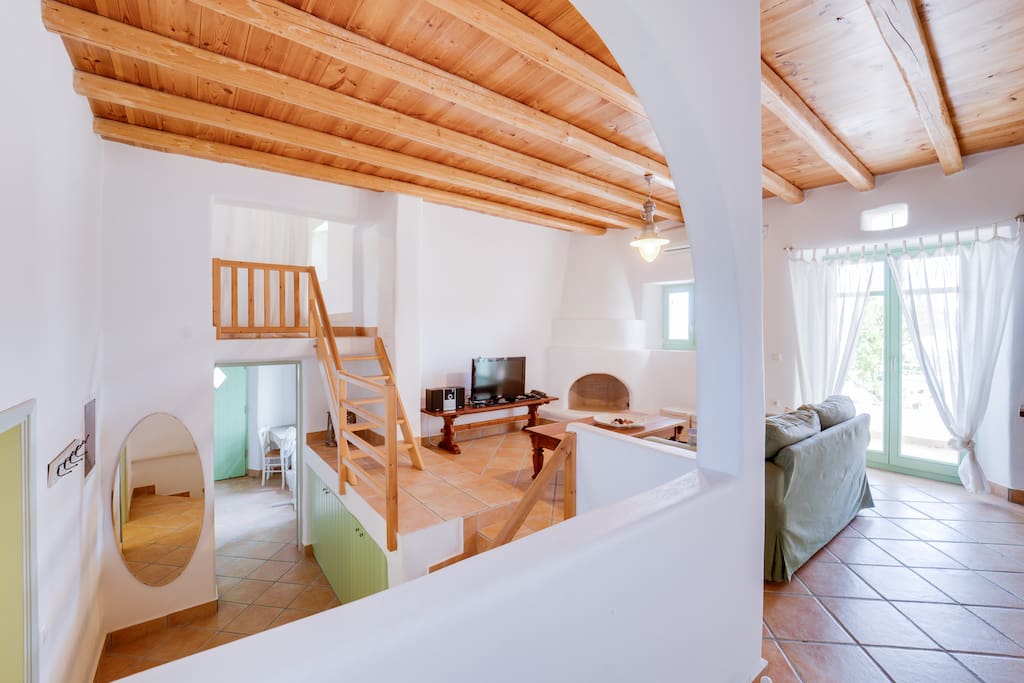 Living room - With the wooden at the back ladder you come to the mezzanine room. Right beneath the mezzanine room is the double room.