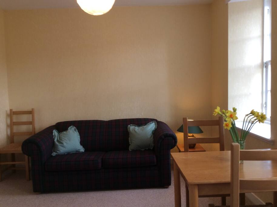 The comfy sofa pulls out to form a double bed.