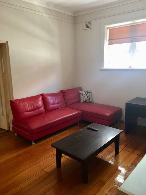 Lounge with desk, TV, ceiling fan
