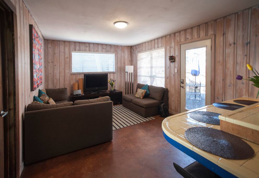 Kitchen bar opens up to Living Room