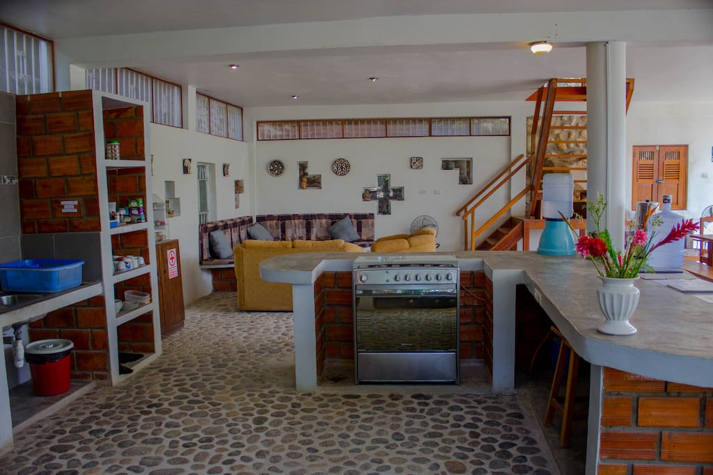 Panoramic of the gorgeous communal first floor. The stonework was laid by hand and sustainably harvested from the Huallaga river.