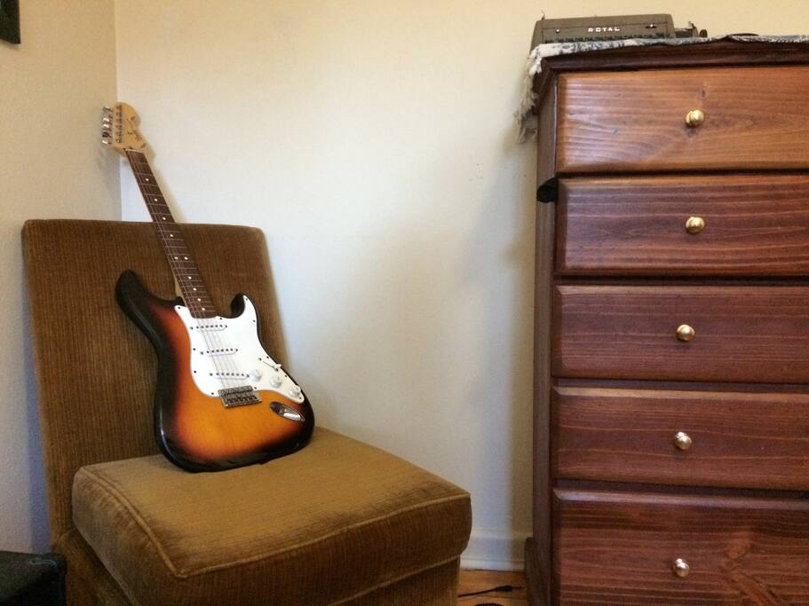 Instruments to play and cupboard to store clothes in