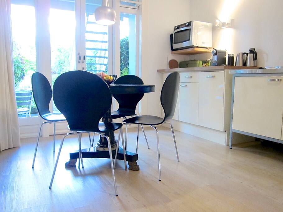 The kitchen has access to the garden