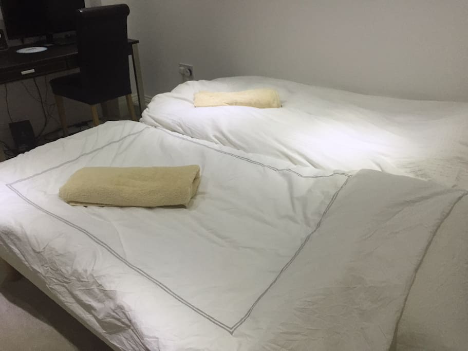 Second bedroom, can easily be used as an office or second living room.