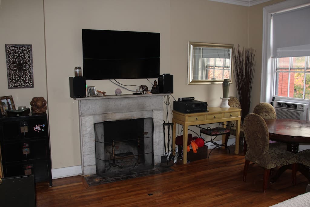 Living room with working fireplace.