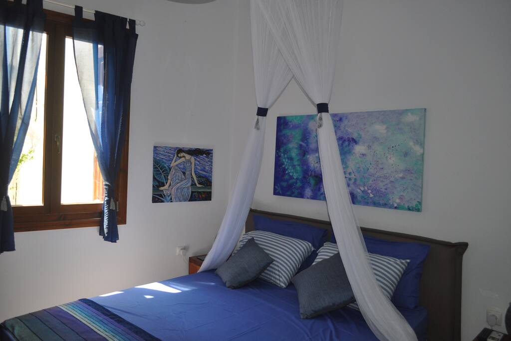 Odyssey Studios - bedroom area with king size bed