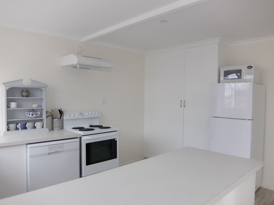 Beautiful light sunny kitchen, with pantry, fridge/freezer and plenty of room