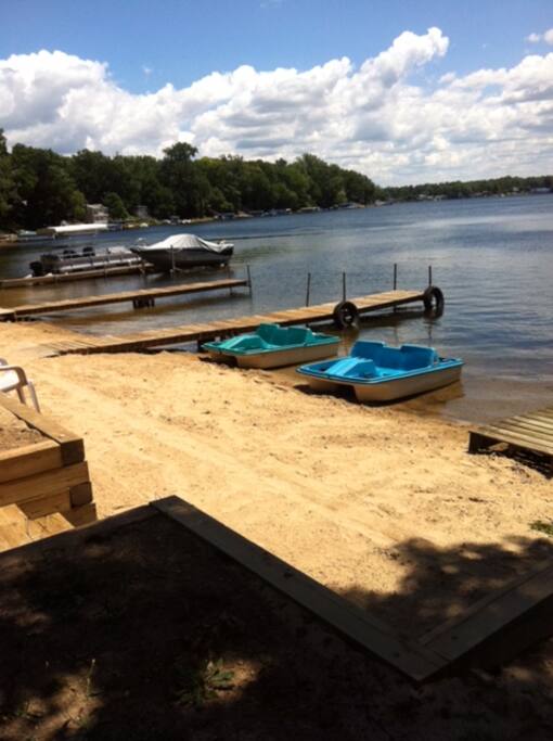 Sandy private fenced-in beach on Round Lake.
