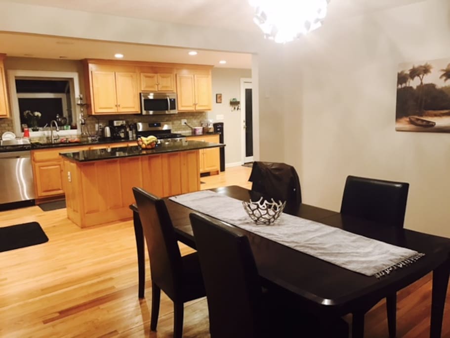 Nice dining area with an open concept on the kitchen for your entertainment.