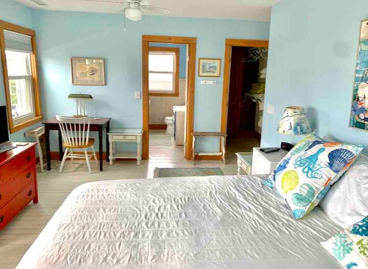 Second-floor king bed, master bedroom, suite with dedicated bathroom, shower, and cast iron, soaking tub. 