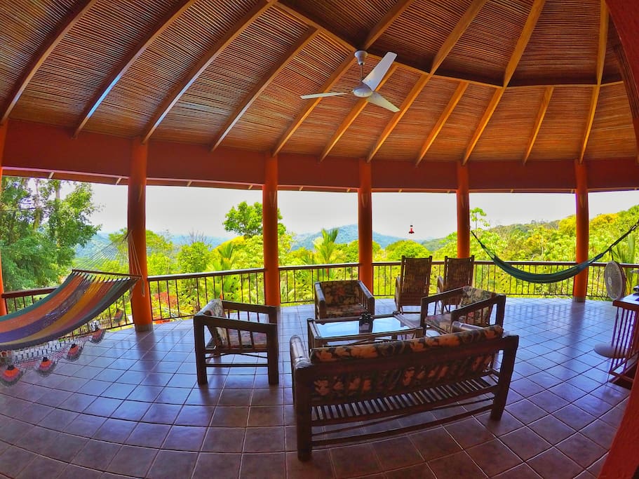 Huge balcony with plenty of seating, 2 large double hammocks, tv and a industrial 60 inch fan to keep you cool.