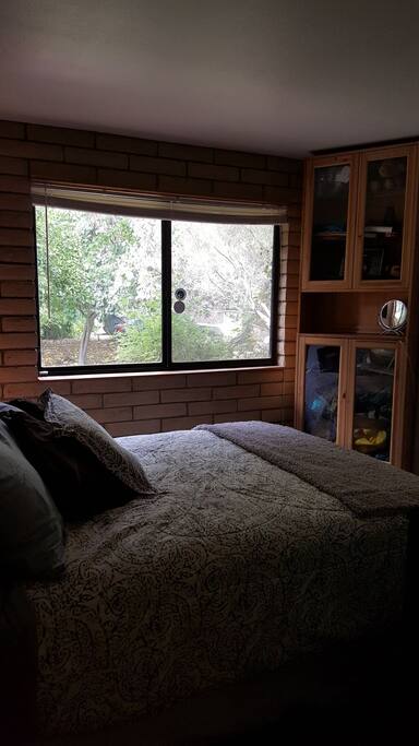 Simple guest bedroom when you just need a bed to crawl into after a night out.