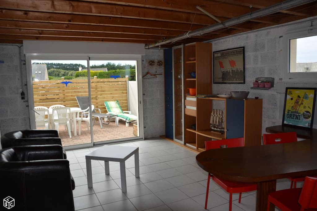 Espace de vie donnant sur terrasse sud