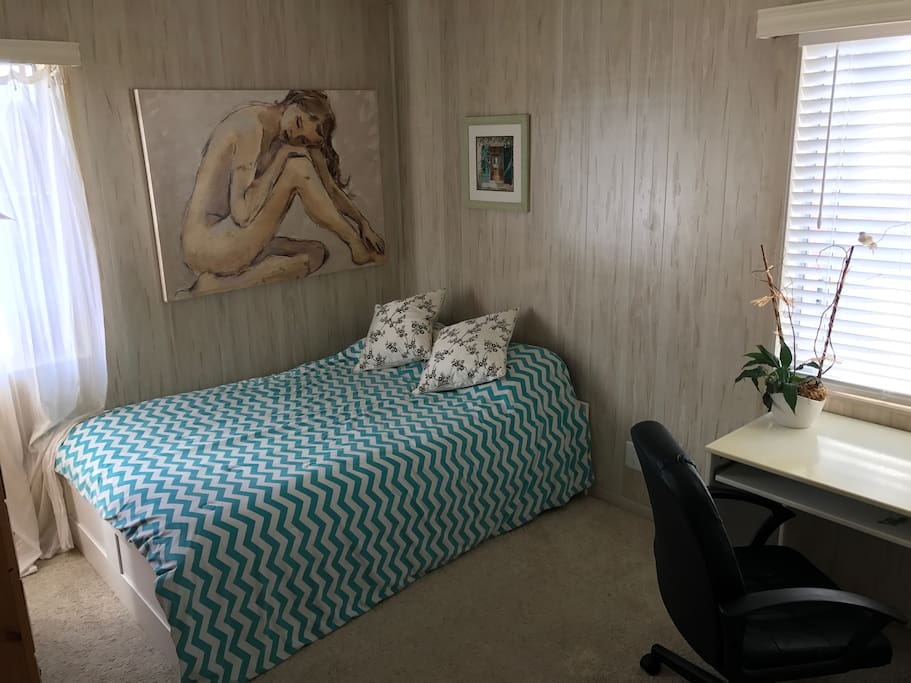 Your room has a full size bed, a desk, chair, lamp, large dresser, mirror and a closet.