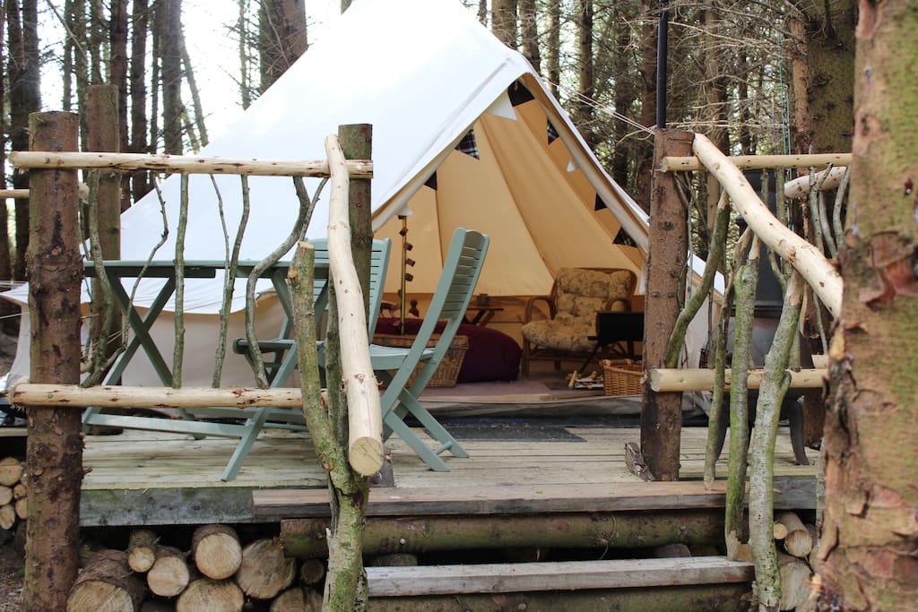 A lovely bell tent for couples complete with log burning stove.