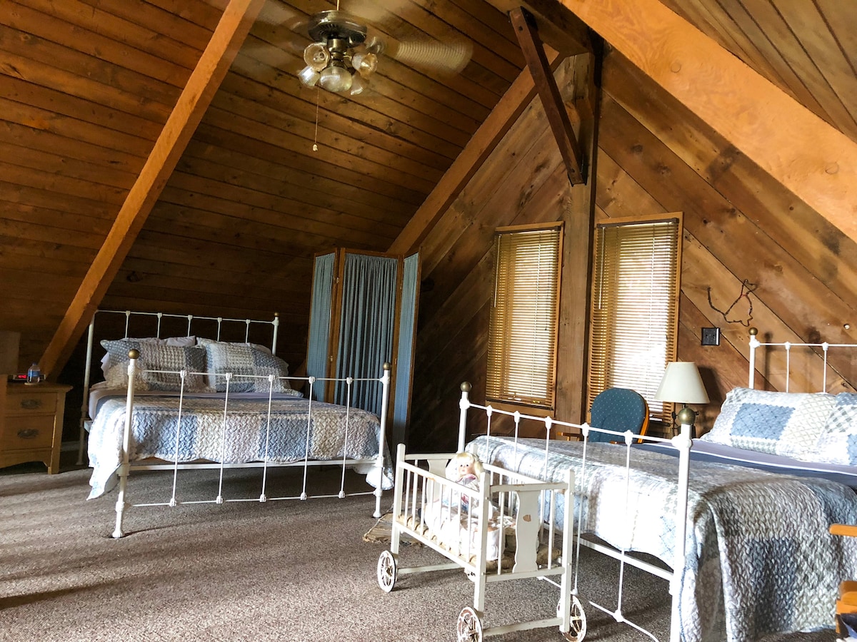 Open loft slaapkamer.