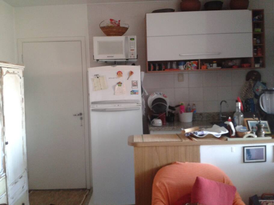 Cozinha americana acoplada à sala
