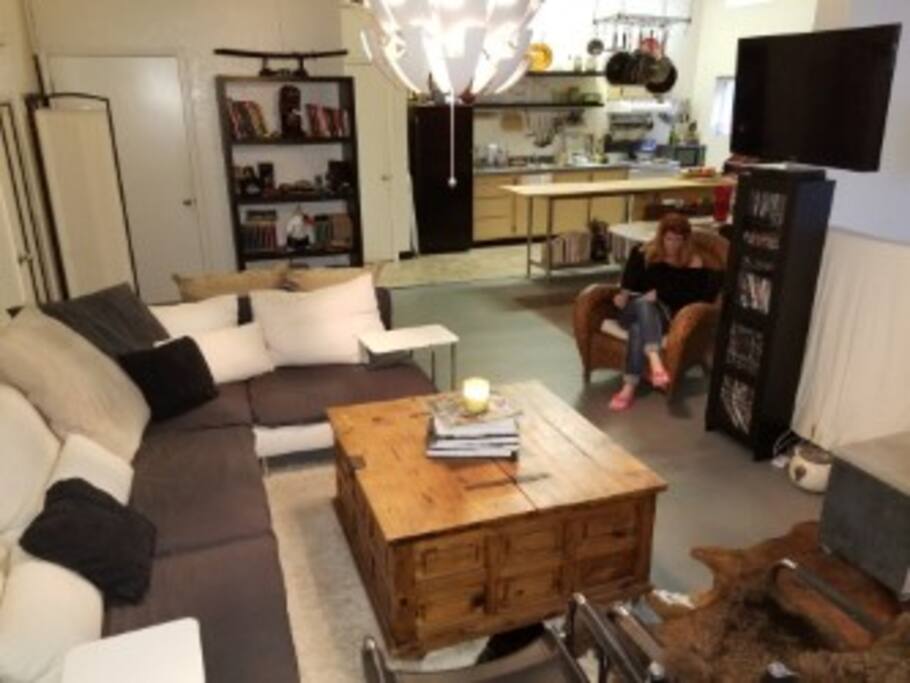 View of living room and kitchen from the front door.