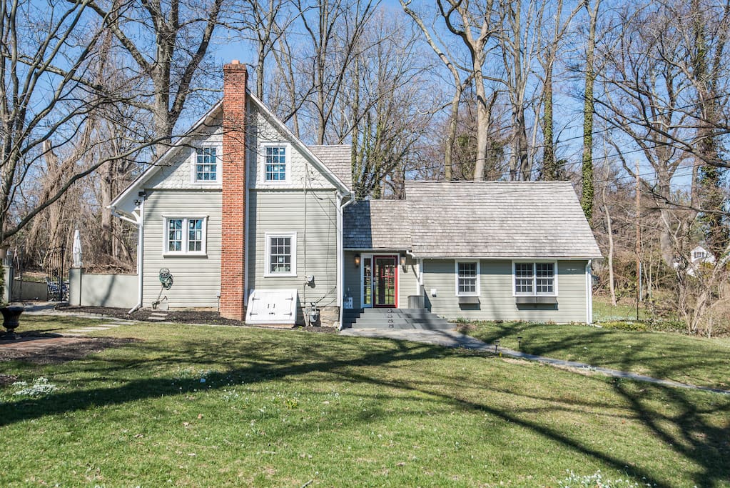 historic charm of a private home on 1/2 acre nestled in an upscale neighborhood