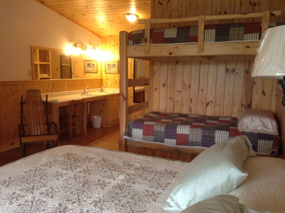 What King Size Bed and two Single, one restroom